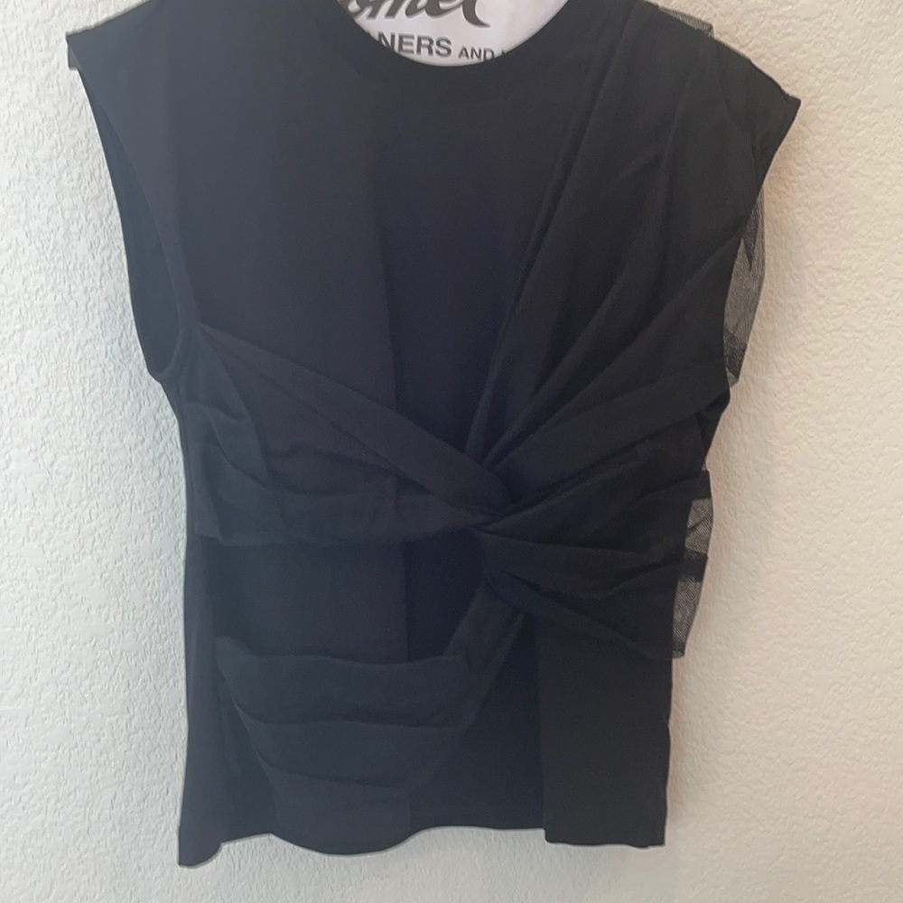 Black sleeveless net detail shirt. MSGM